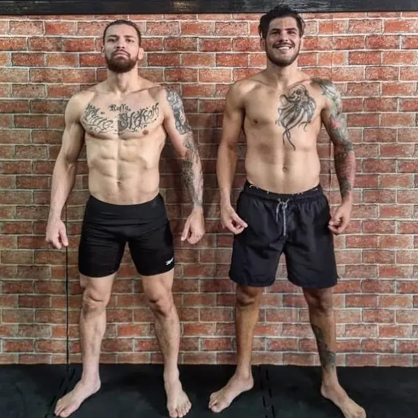 Kevem and a partner side by side, ready for the weigh-in