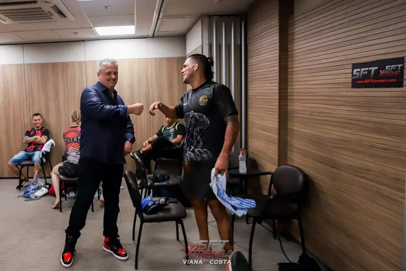 Kevem and his coach in the locker room before the fight