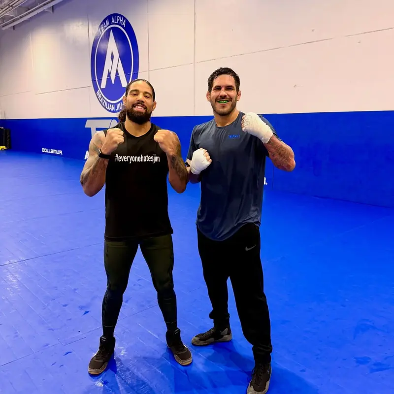 Kevem with a student after class