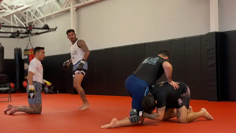 Kevem grappling with the team