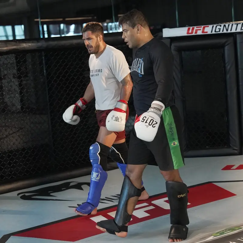 Kevem training in the cage with a partner