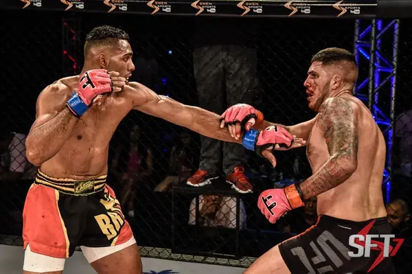 Kevem trades strikes in an SFT fight