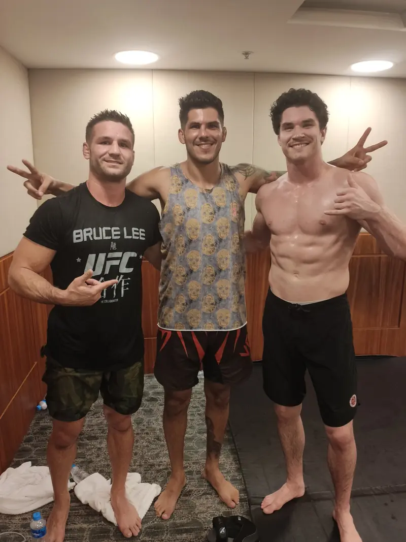 Kevem with two fighters backstage