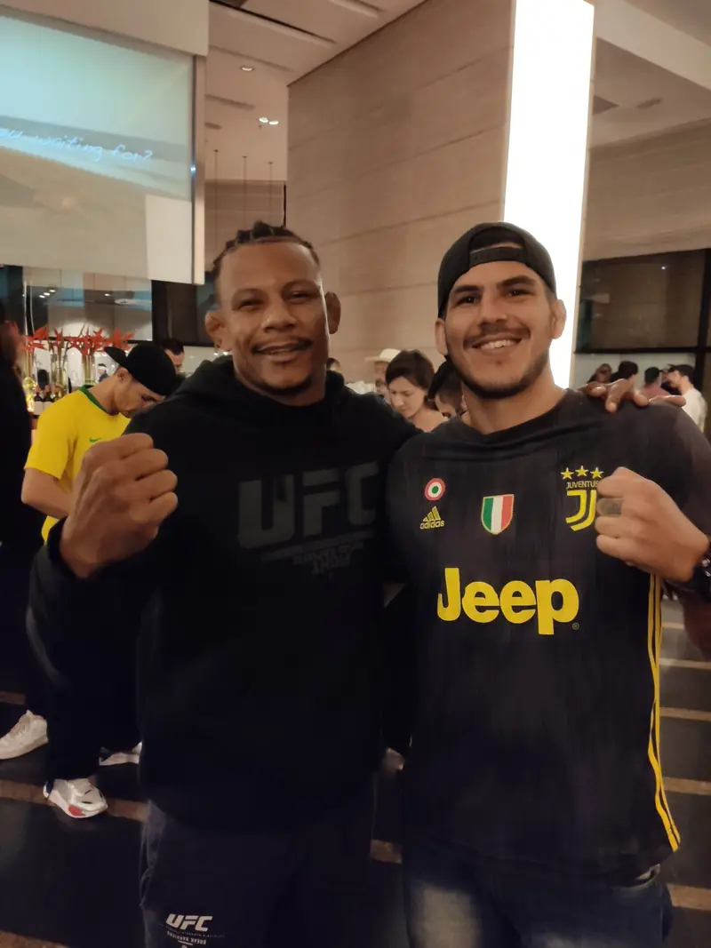 Kevem with a friend at a UFC event