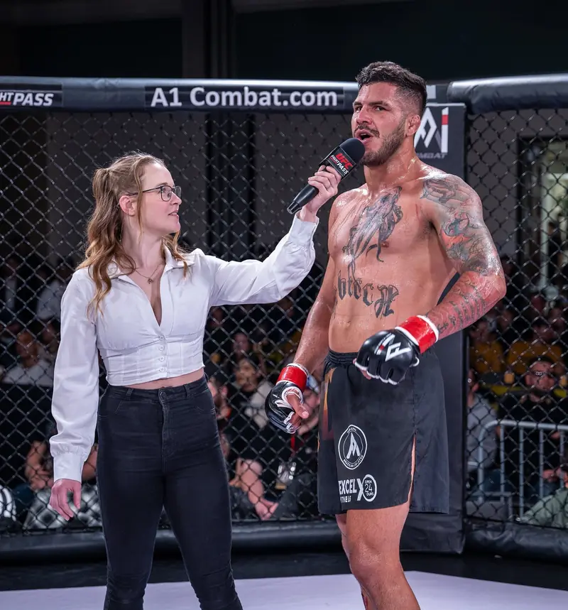 Kevem gives an interview in the A1 Combat cage